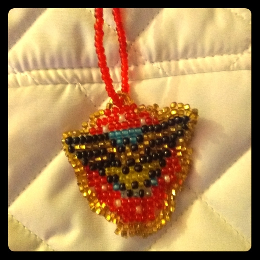 Wonder Woman Necklace w/free gift.